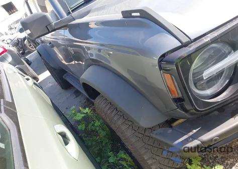 2023 Ford Bronco Wildtrak z USA, uszkodzony, nr VIN 1FMEE5DP4PLB39967